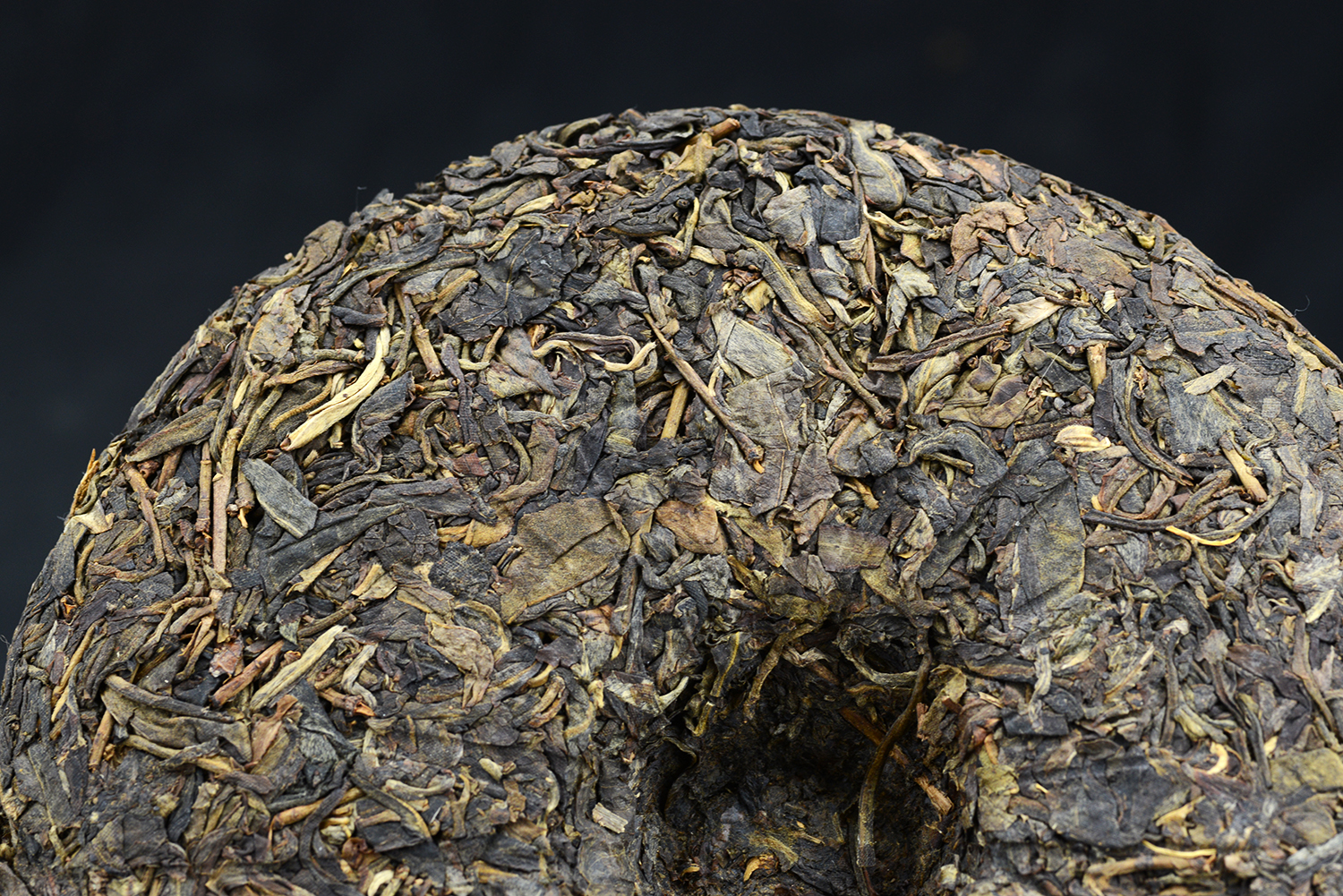 2002 Jixing Yiwu sheng puerh tea cake 